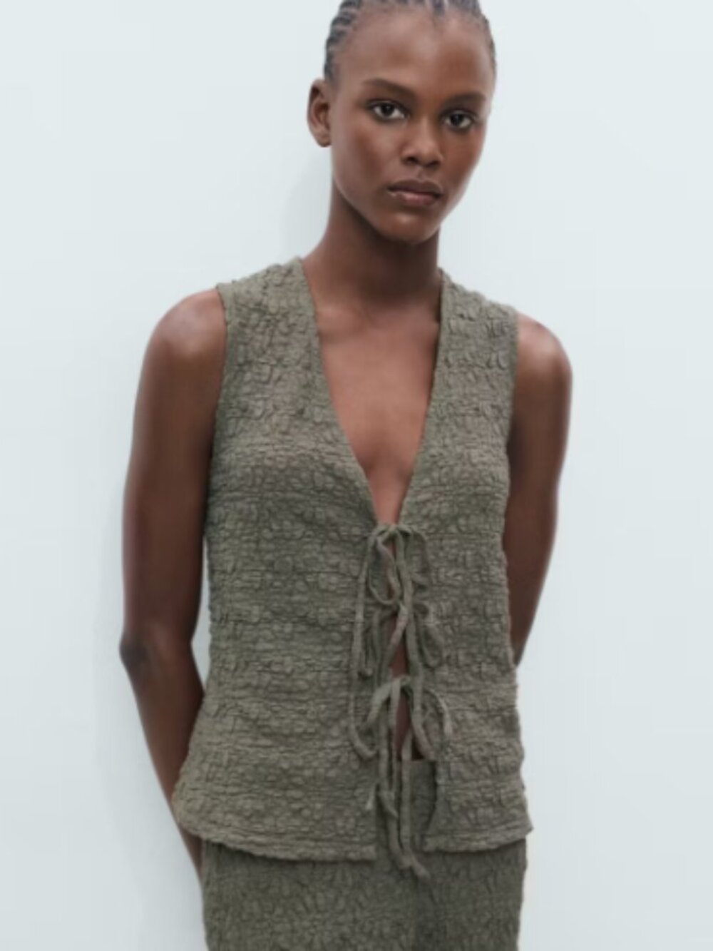 Texture Bow Sleeveless Top